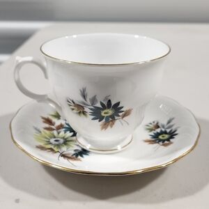 Queen Anne Bone China Teacup and Saucer with Floral Design and Gold Trim